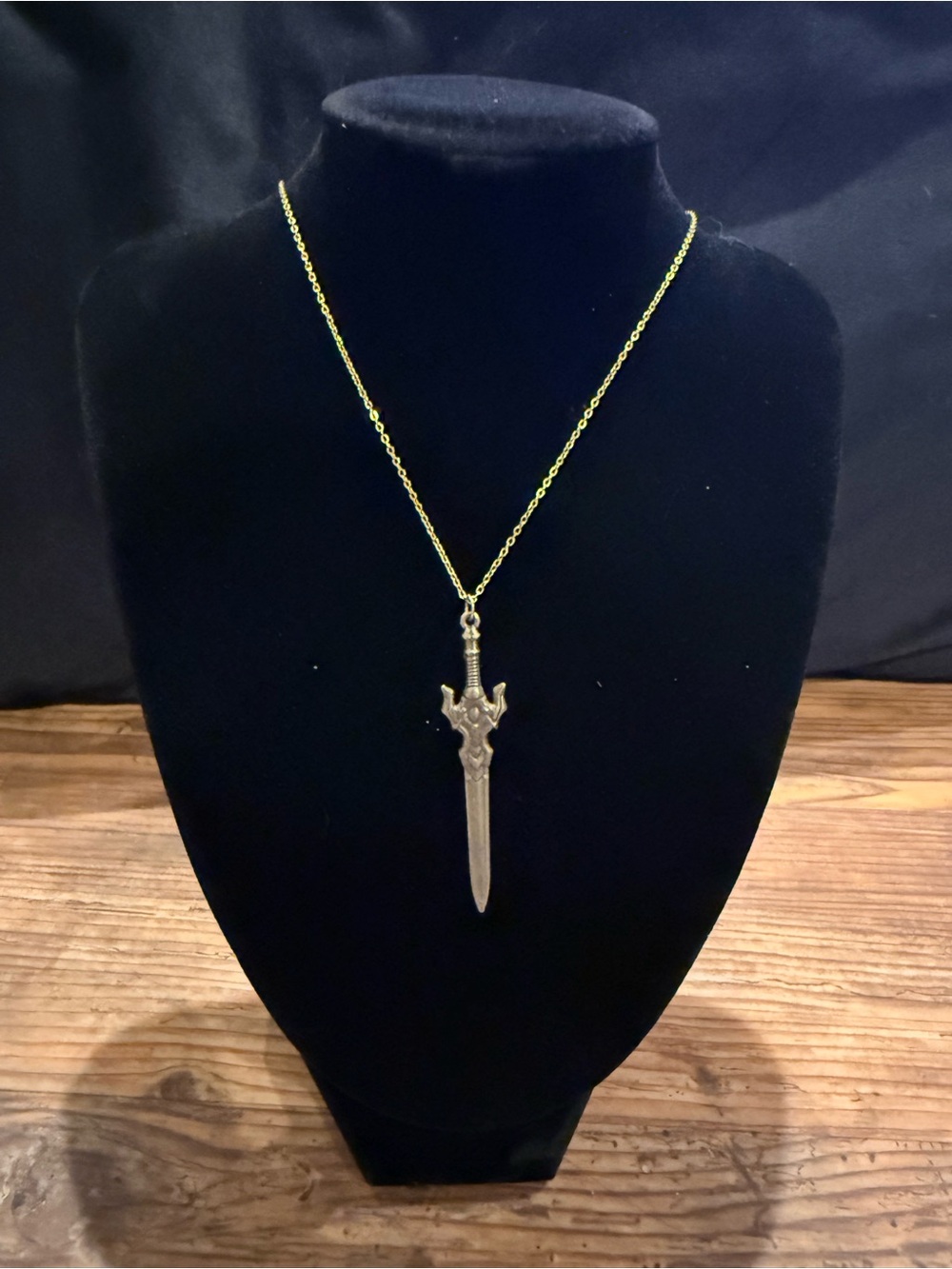 Gold sword necklace